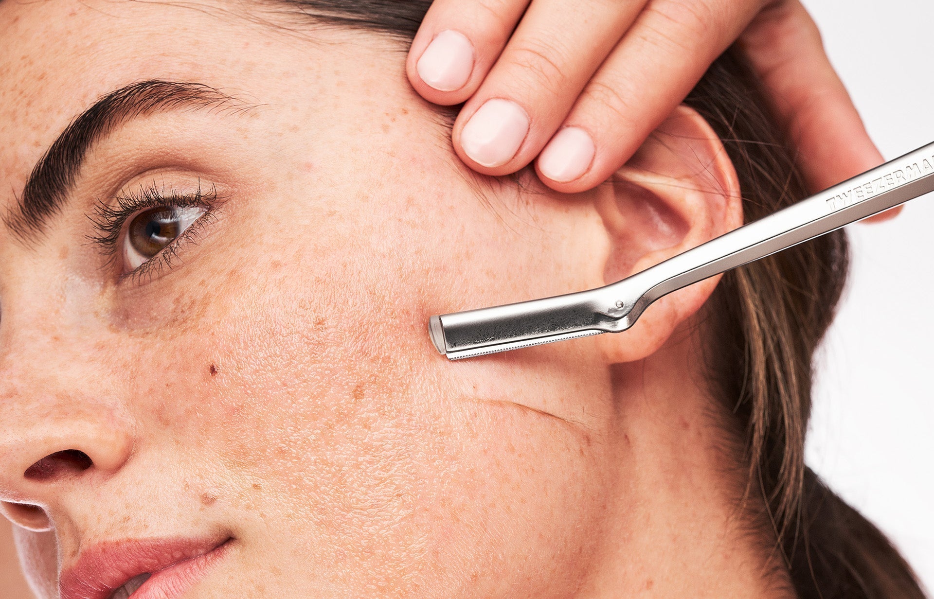 Dark hair model using the Facial Razor