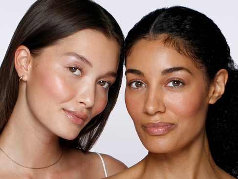 2 diverse models with varying features freshly groomed.
