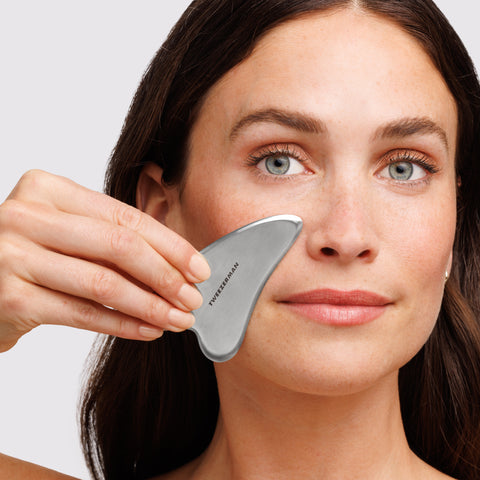 Model using Stainless Steel Gua Sha