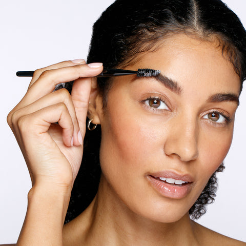 Model using Brow & Lash Brush