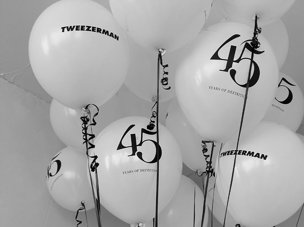 45 years of definition and Tweezerman logo balloons