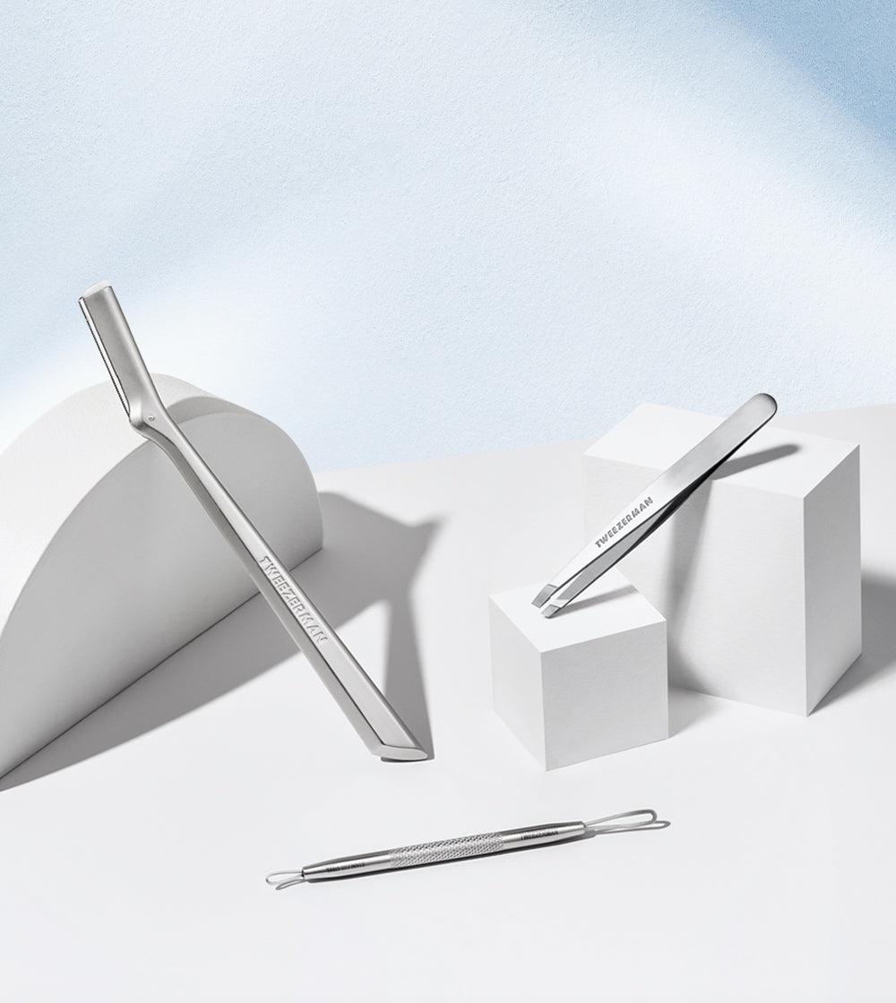 Stainless Steel Tools with a blue background - portrait image