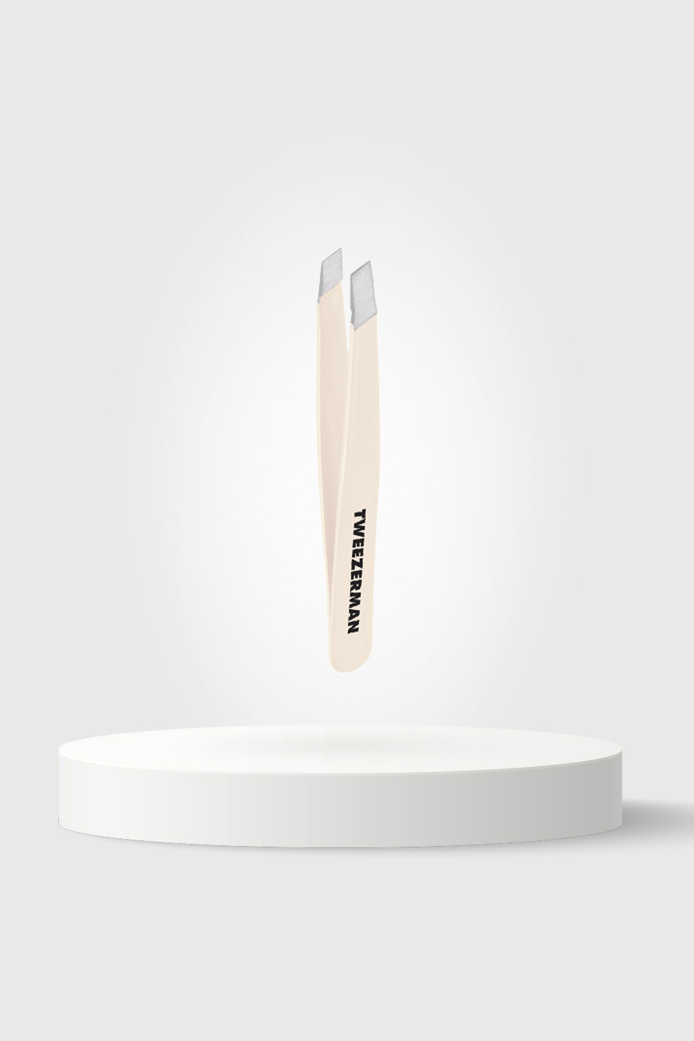 Micro Mini Tweezer on a white block