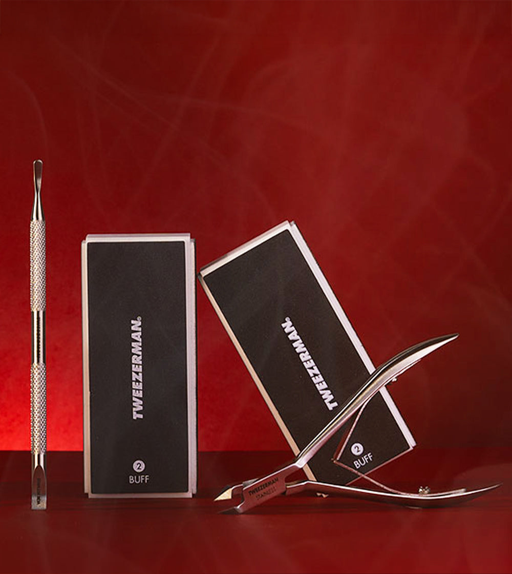 Manicure tools for Halloween on an red background