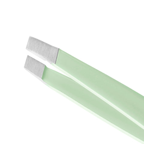 Pistachio green coloured tweezer with a focus on the slant tips