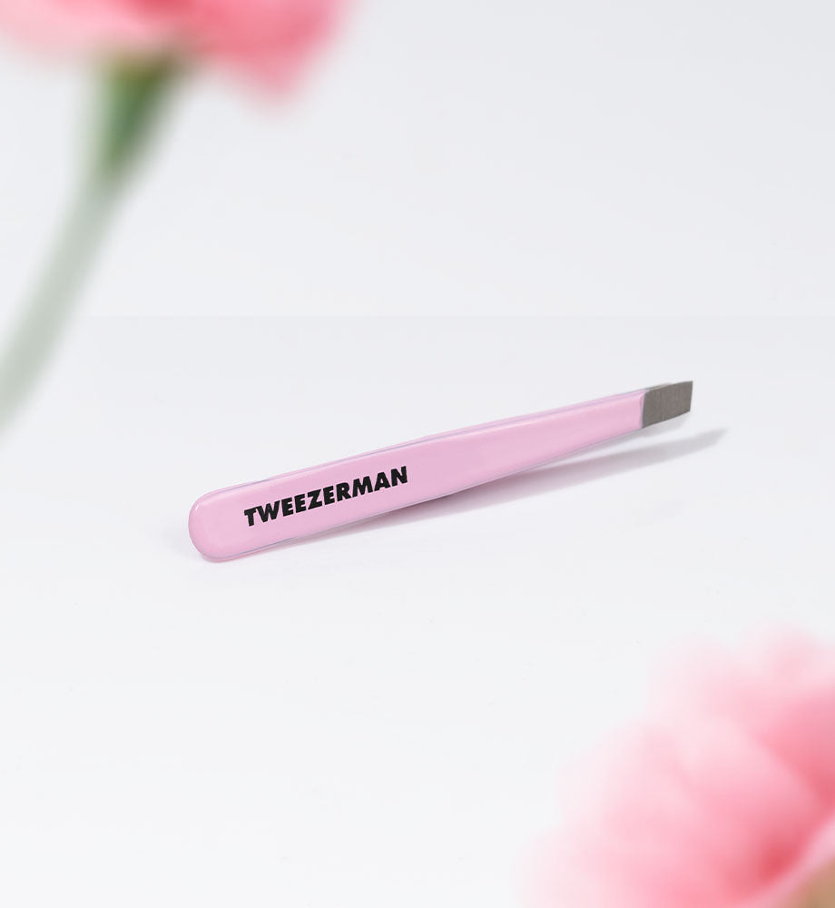 Light Pink tweezer with 'Tweezerman' branding on a light background