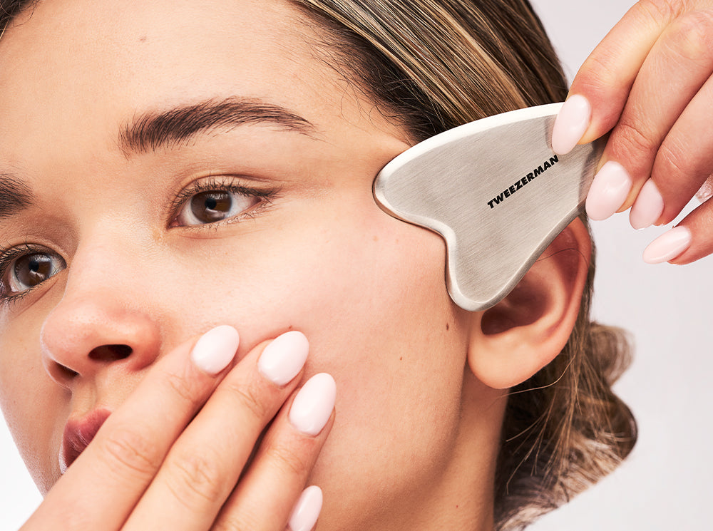 Model using the Stainless Steel Gua Sha