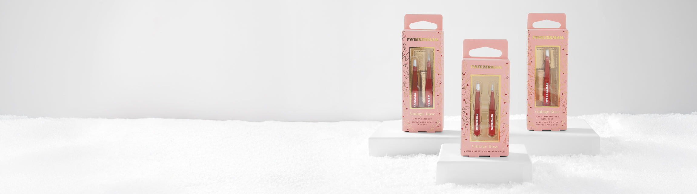 Landscape image of 3 Vintage Rose Tweezer Gift sets in their packaging