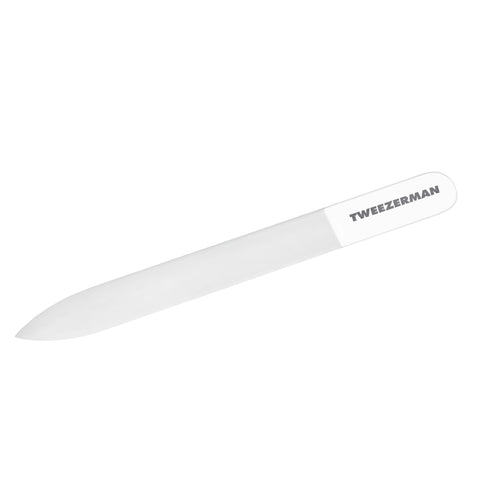 Glass nail file, one end is pointed and one end is rounded with Tweezerman logo