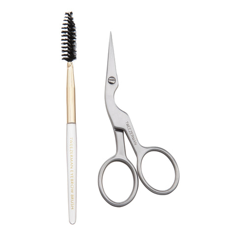Brow shaping brush with white handle, gold ferrule, black spoolie brush head 