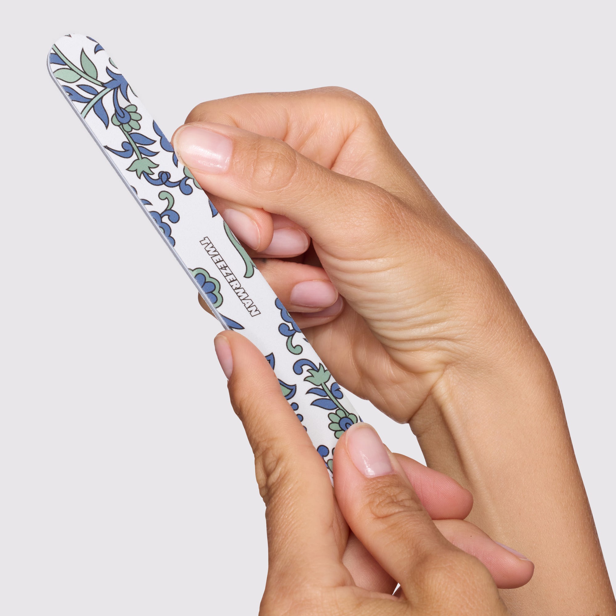 Model using and filing with Paisley Nail File