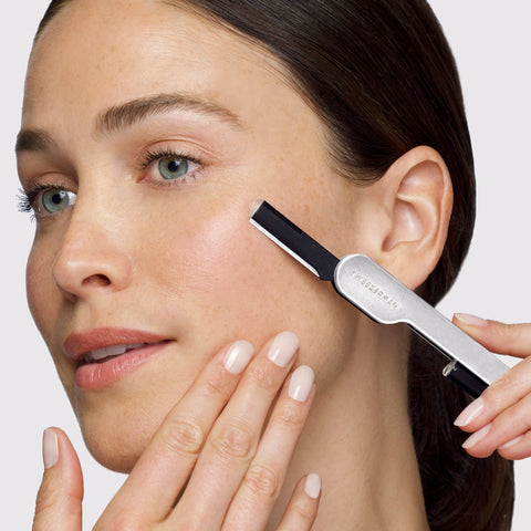 Model using Brow & Facial Grooming Set's Adjustable Facial Razor
