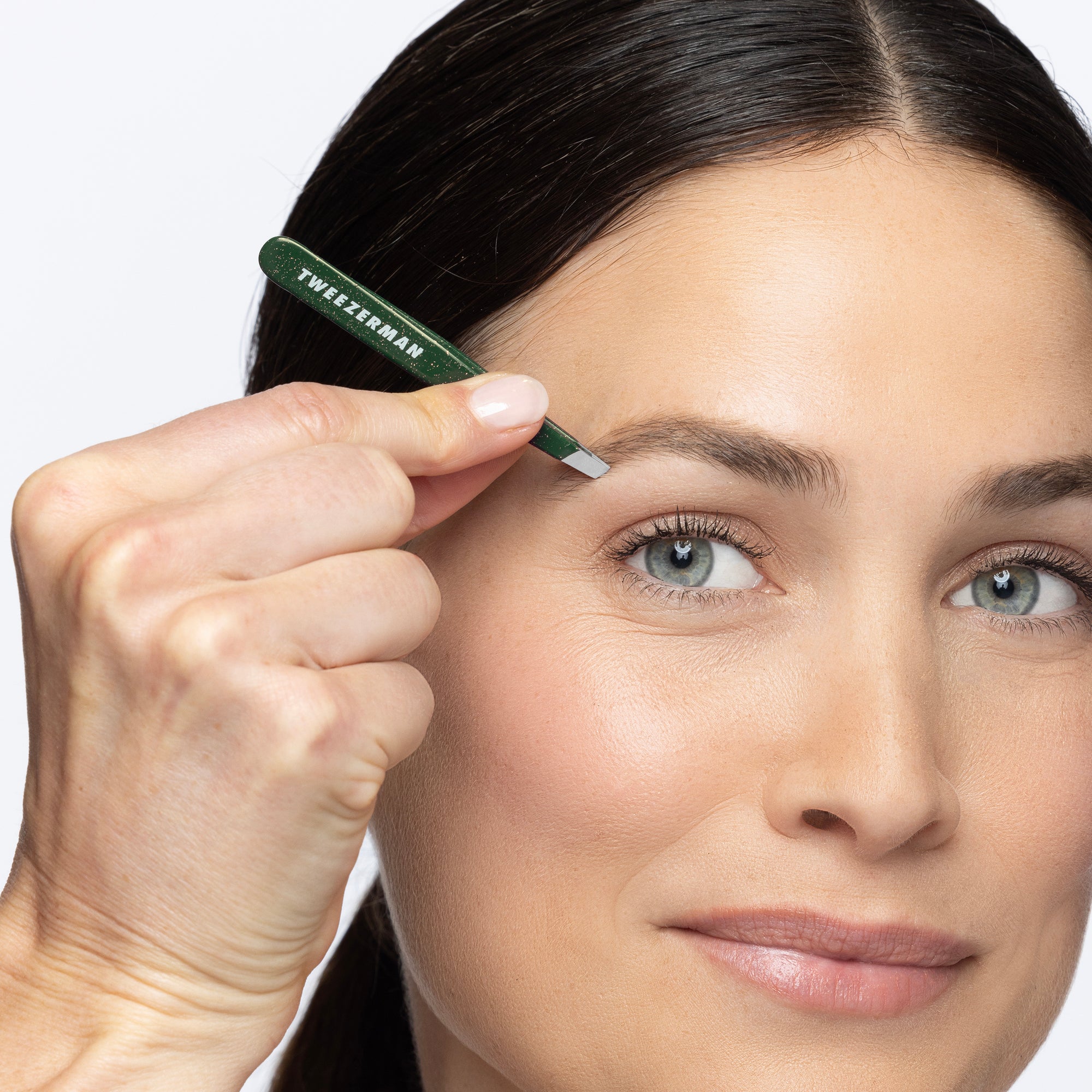 Model using enchanted garden mini slant tweezer
