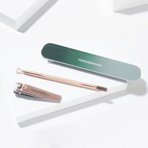 1 dark green nail file with rose gold fingernail clipper and cuticle pushy